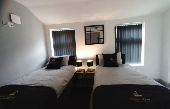 Black Pearl Luxury Apartments - Photo 10