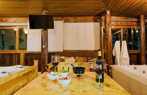 Chalé romântico com banheira aquecida - Foto 24