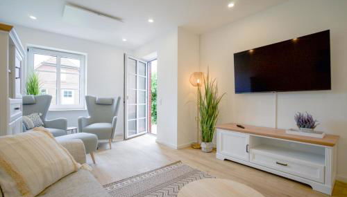 Sonnenterrasse - Helle & moderne Ferienwohnung am Meer - Foto 3