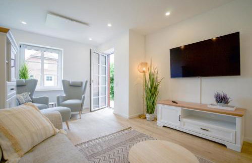 Sonnenterrasse - Helle & moderne Ferienwohnung am Meer - Foto 3