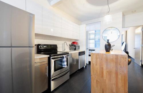 E10-1 Designer East Village Townhouse 1BR - Foto 12