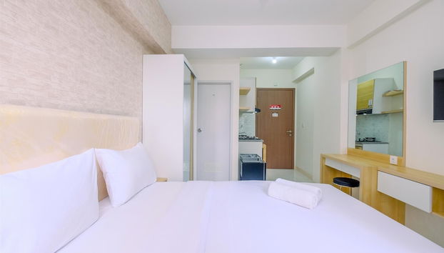 Nice and Warm Studio at Podomoro Golf View Apartment - Foto 3, Habitación