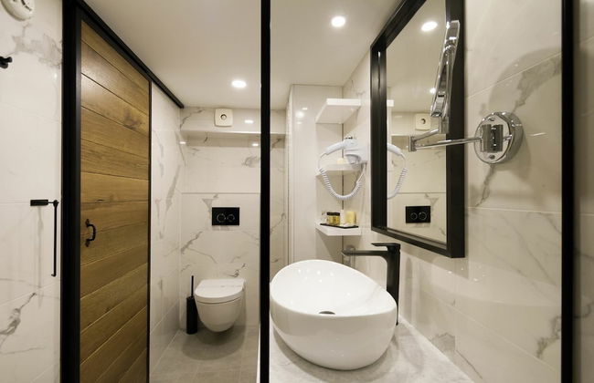 DeZign Apartments - Photo 40