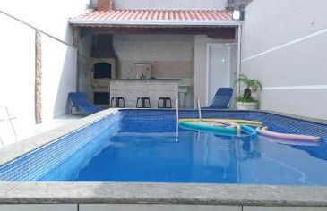 "Lindíssima Casa Pé na Areia com Opção da Piscina Aquecida Cobrado a Parte, Sala de Jantar, 3 Amplos Quartos, Sendo1Suíte, Amplo Espaço de Lazer com Área Gourmet em Deck Coberto com Churrasqueira e Mesa de Bilhar Frente a Piscina, Super Pertinho da Praia" - Photo 9