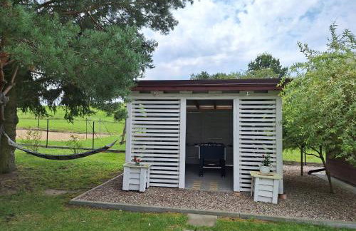 Biały domek nad stawem - Foto 7