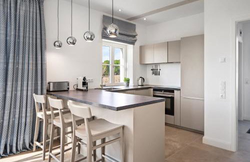 GUT KLETKAMP "Mühlenhof 5" - Ruhige Ferienwohnung mit 3 Schlafzimmern I Terrasse mit See- & Naturblick I Gemeinschaftsgarten I 15 Min zur Ostsee I Küche I Parkplatz I Waschmaschine I WLAN - Foto 4