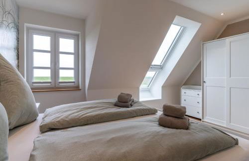 Doppelhaushalfte in Karolinenkoog - Foto 24