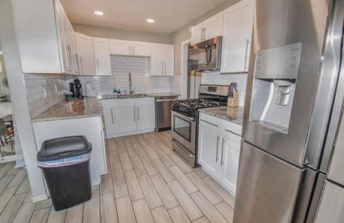 Family Home with Large Yard & Golf Theme Near Rail - Photo 16