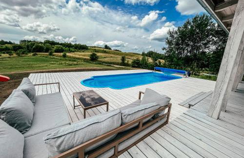 Sielski dom z basenem w Rydzewie - Foto 5