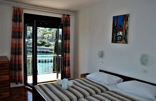 Apartmani Kadmen - Photo 12