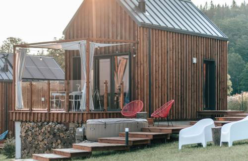 WymarzONE domki- z prywatnymi jacuzzi i kominkiem - Foto 18