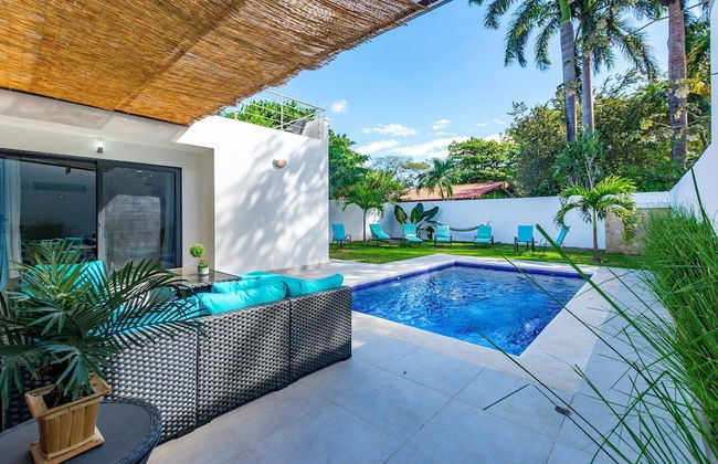 Ultramodern Townhome with an Inviting Coastal Design and Lush Outdoor Oasis with a Private Pool - Photo 28