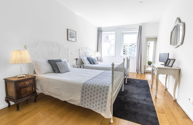 Bright 3BR Flat w/ AC in City Center by LovelyStay - Photo 13