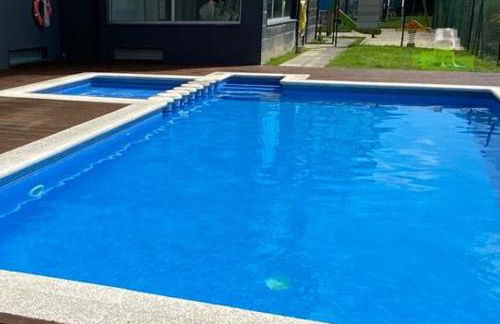 Apartamento de playa familiar, piscina y garaje. - Foto 16