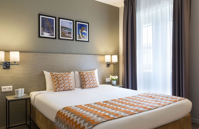 Citadines Antigone Montpellier - Photo 7