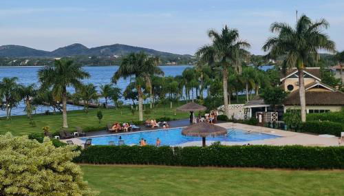 Completo apartamento em Resort na beira da lagoa - Foto 2