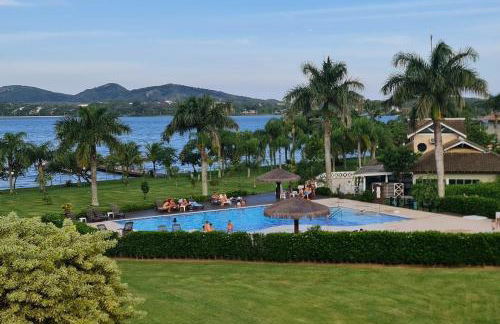 Completo apartamento em Resort na beira da lagoa - Foto 2