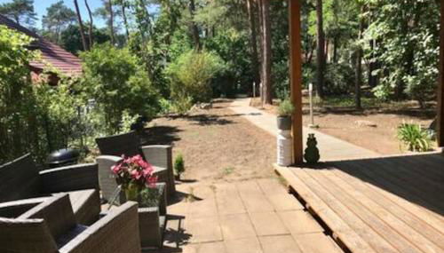 FEWO PARTNERS Haus Clemens - Gemütliches Holzhaus mit Grundstück nahe Badesee - Foto 2, Garden, Garden view