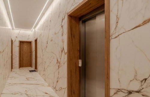 Sleek & Modern Flat w/ Private Garage by HostWise - Photo 30