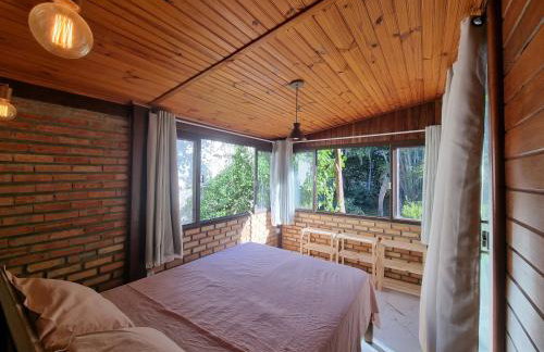 Casa 4 dorms 2 suites - localização perfeita no centrinho e rodeada de natureza - Foto 11