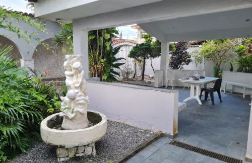 Casa 30 metros da praia com wifi e garagem 6 carros - Photo 16