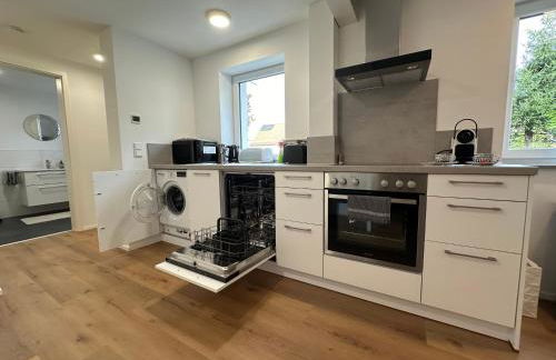 Modernes Apartment mit eigener Terrasse & Garten - Foto 11