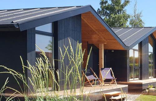 Werder Chalet -- COZYKOJE -- Ostsee Strand 150m I Sauna I eKamin I Tiny House mit Meerblick I 2 Pers und Kind I by "Meyers am Meer" - Foto 1