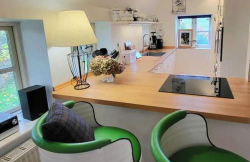 Die blaue Reetdachkate am Deich - Photo 4