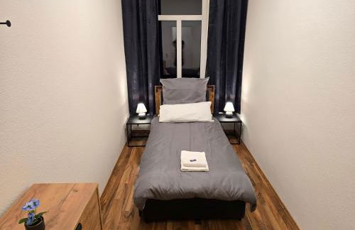 Boardinghouse mit 10 großen Apartments mit Parkplatz und Balkon - Photo 3