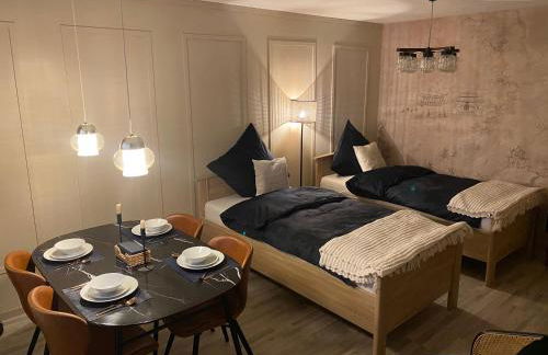 Stylisches City Apartment mit Balkon und Garage - Foto 1