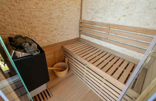 Dans résidence neuve LE SNOW ROC sur les pistes, appartement 8 personnes 2 chambres et coin montagne avec Terrasse WIFI et SAUNA - Photo 31