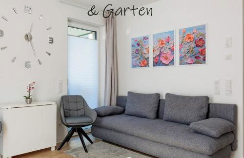Modernes Apartment mit Terrasse & Garten, Parkplatz & 24h Self-Check-in - Foto 10