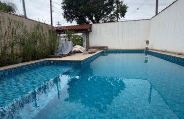 Casa Praia Grande 5min praia, 2 vagas, wi fi , 3 banheiros , piscina grande , freezer extra gelo , churrasqueira , até 9 pessoas - Photo 1