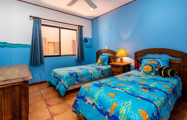 Beachfront Condo with Warm, Rustic Interiors & Direct Access to Playa Flamingo - Photo 6