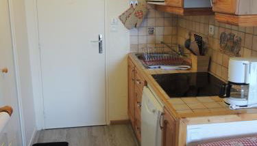 F2 Le Corbier aux pieds des pistes, commerces et esf - Photo 3