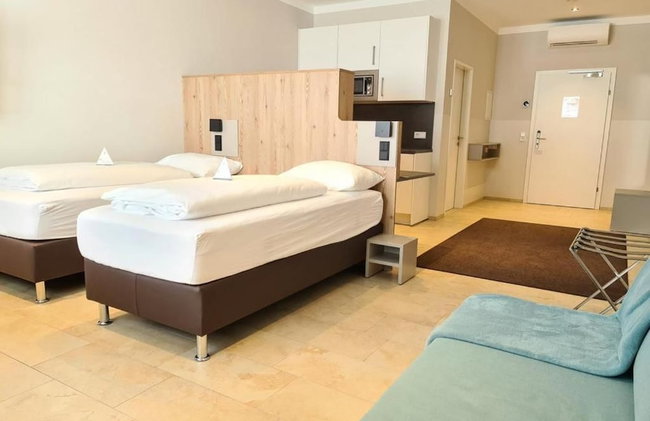 TT Aparthotel Neuhofen - Photo 12