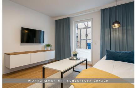 Apartment Leinetal mit Kamin & Kaminholz, 1-3 Personen , Schlafzimmer mit Boxspringbett 180x200 & hochwertige Hotelbettwäsche, bequemes Einzelbett im Wohnzimmer, Terrasse, Einbauküche, - Photo 8