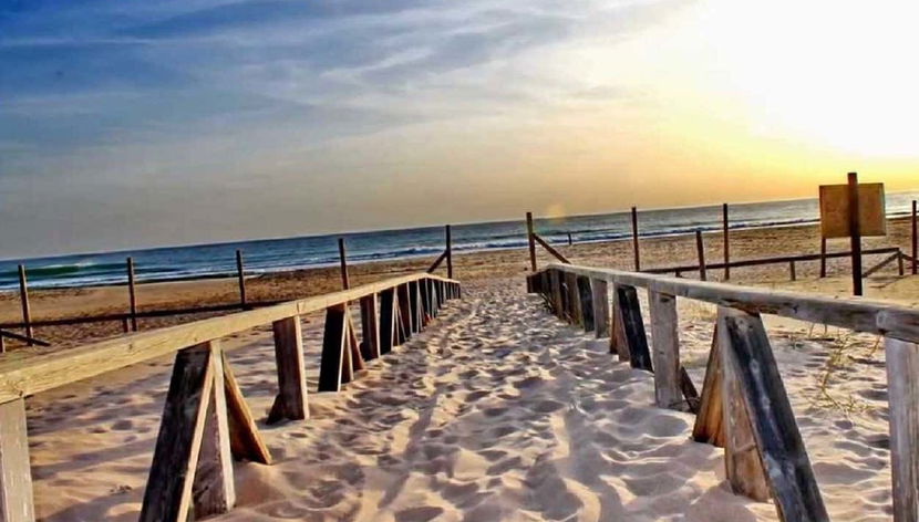 Admire the sunset at Playa del Palmar