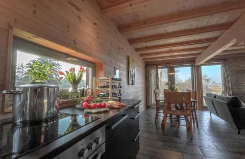 traumHaff Küstenchalets - einzigartige Chalets an der Ostsee. Ganz aus Lärchenholz mit Kamin und Sauna - Foto 12