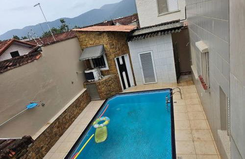 Belíssima Casa a Beira Mar com Piscina Aquecida Cobrado a Parte, 5 Quartos com Ar Condicionado, Amplo Salão de Jogos com Mesas de Bilhar e Pebolim, Amplo Espaço Externo com Churrasqueira em Deck Gourmet Coberto frente a Piscina,Tudo isso á Beira Mar - Photo 23