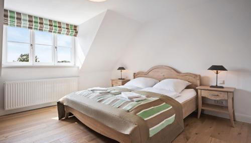 GUT KLETKAMP "Mühlenhof 3" - Ruhige Ferienwohnung mit 2 Schlafzimmern I Terrasse mit See- & Naturblick I Gemeinschaftsgarten I 15 Min zur Ostsee I Küche I Parkplatz I Waschmaschine I WLAN - Foto 5