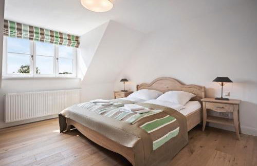 GUT KLETKAMP "Mühlenhof 3" - Ruhige Ferienwohnung mit 2 Schlafzimmern I Terrasse mit See- & Naturblick I Gemeinschaftsgarten I 15 Min zur Ostsee I Küche I Parkplatz I Waschmaschine I WLAN - Foto 5