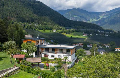 Felsenegg appartements - moderne Wohnungen im Luftkurort mit traumhaftem Garten Nähe Meran für Paare und Familien - Foto 8