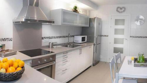 Con Encanto - Photo 4