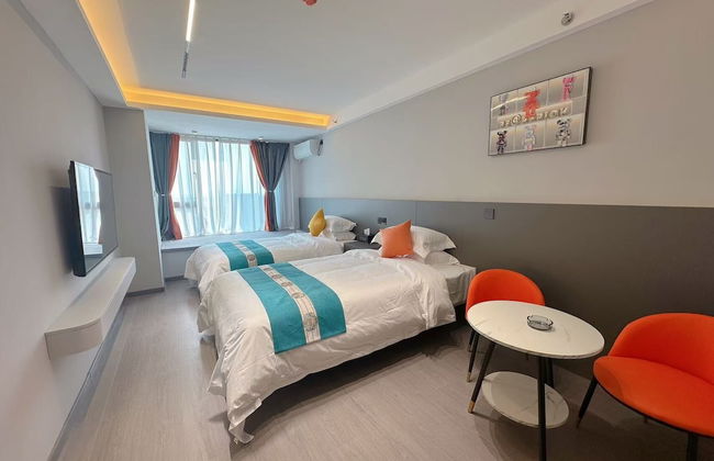 Qin Mengli Hotel - Photo 9