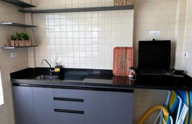 APTO BEIRA MAR - ACONCHEGANTE _ VARANDA GOURMET - WIFI - NETFLIX - TV A CABO - PRAIA GRANDE - Photo 8