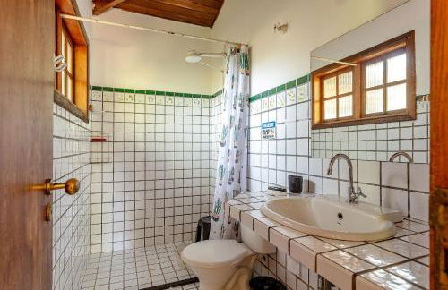 Casa dos Pássaros na areia a 20m da Praia da Baleia com 3 suítes e 1 dorm com ar condicionado, wifi, smart tv, cozinha completa e churrasqueira - Foto 22