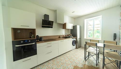 Immeuble 3 Hébergements Entre Dombes et Saône - Foto 3, stove, dishwasher, toaster