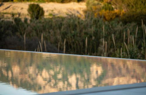 Reveli Suites - Photo 21