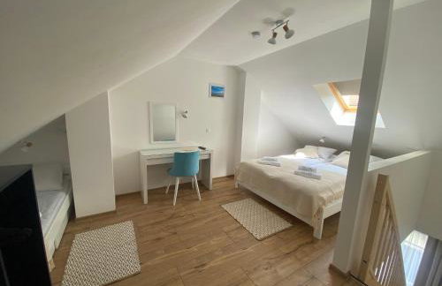 SOLEK, Apartamenty hotelowe i pokoje gościnne ze śniadaniem, przyjazne zwierzętom, wyjątkowe, z widokiem na Jezioro Jamno i w bardzo bliskiej odległości od morza - Foto 30